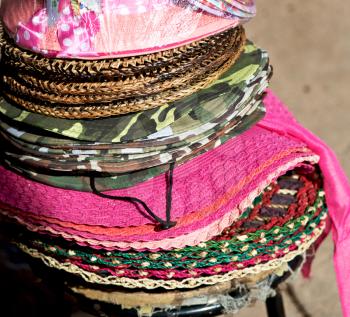 blur  in  philippines  lots of fashion trandy hats in a market like souvenir