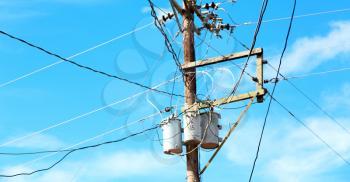 blur  in  philippines   a electric pole with transformer and wire  the cloudy sky