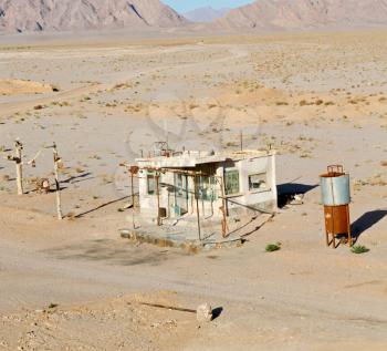 blur in iran old gas station  the desert mountain background and nobody