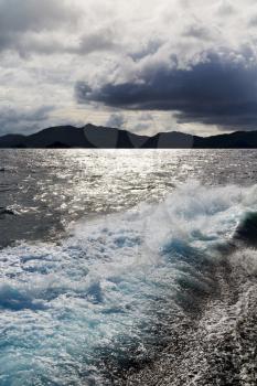 in philippines island the pacific ocean clouds and lights view from a boat