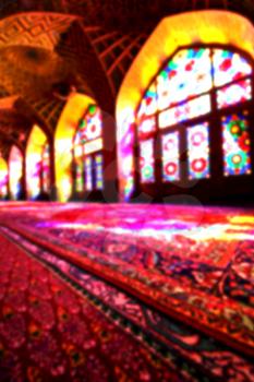 in iran blur colors from the windows the old mosque traditional scenic light