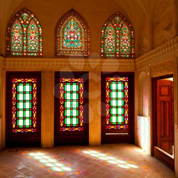 in iran blur colors from the windows the old mosque traditional scenic light