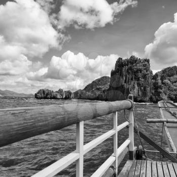 blur  in  philippines   view of the island hill from the prow of a boat