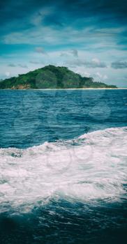 blur  in  philippines   a view from  boat  and the pacific ocean  mountain background