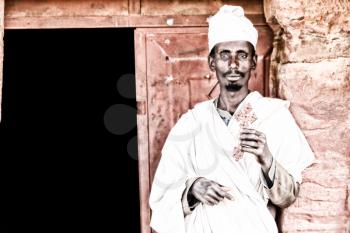  ETHIOPIA,LALIBELA-CIRCA  JANUARY 2018--unidentified priest praying  in the genna celebration
