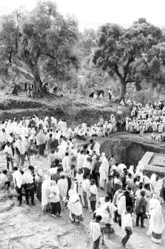 ETHIOPIA,LALIBELA-CIRCA  JANUARY 2018--unidentified people in crowd of  the genna celebration and the church
