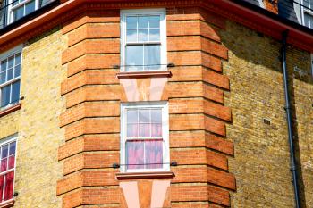 in europe london old red brick wall and          historical window