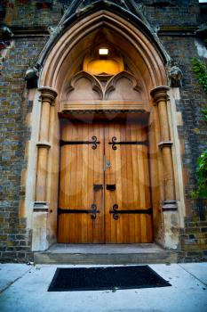 wooden parliament in london old church door and marble antique  wall