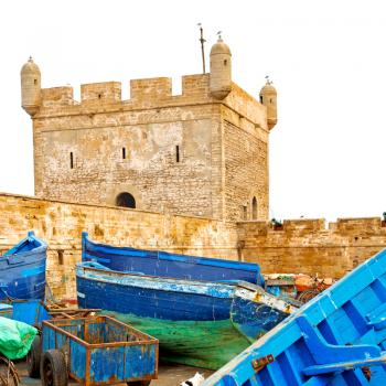   boat and sea in africa morocco old castle brown brick  sky
