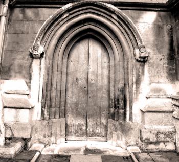 weinstmister  abbey in london old church door and marble antique  wall