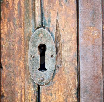 door in italy old ancian wood and traditional            texture nail