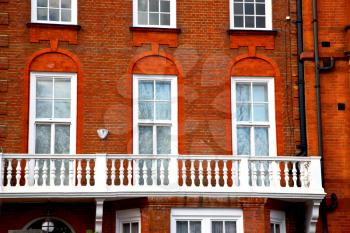 in europe london old red brick wall and            historical window