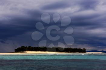  cloudy in indian ocean madagascar mountain  sand isle beach sky and boat