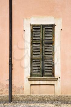 window  varese palaces italy   abstract  sunny day    wood venetian blind in the concrete  brick