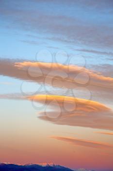 sunrise in the colored sky white soft clouds and abstract background