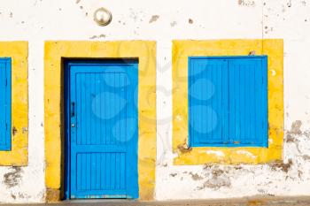 olddoor in morocco  africa ancien and wall ornate brown   blue