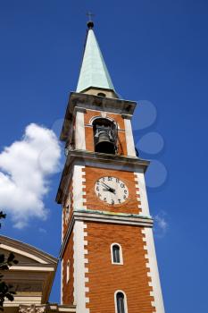 church   olgiate olona   italy the old wall terrace church window  clock and bell tower