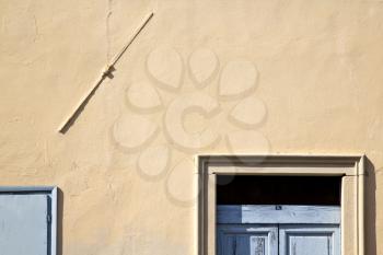 abstract in venegono italy   the old  wall  and church door  