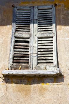 lonate ceppino varese italy abstract  window      wood venetian blind in the concrete  blue