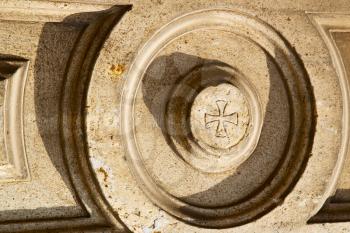lonate pozzolo lombardy italy  varese abstract   wall of a curch circle  pattern  cross