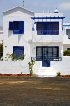 house step cactus bush  rock stone sky in arrecife lanzarote spain
