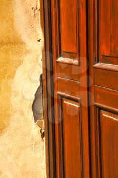  abstract church door   in italy   lombardy   column  the milano old      closed brick  