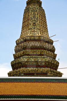 tower  bangkok in the temple  thailand abstract cross colors roof wat  palaces   asia sky   and  colors religion mosaic sculpture