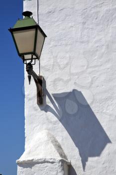 street lamp a bulb in the blue sky wall arrecife teguise lanzarote spain