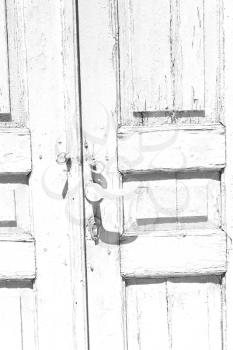 door  in italy old ancian wood and traditional               texture nail