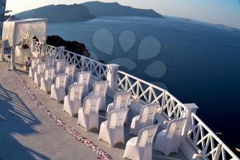 anniversary  and marriage cerimony in the sea of santorini greece island europe