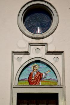  italy  lombardy     in  the abbiate       old   church   closed brick tower   wall rose  window