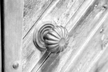 door in italy old ancian wood and traditional               texture nail