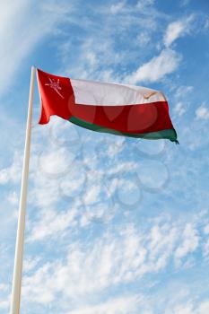 and the cloudy sky in oman waving flag 