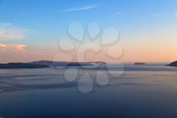 in europe greece santorini island hill and rocks on the summertime beach 