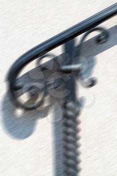  in the white concrete wall and shadow black balauster acces abstract handrail