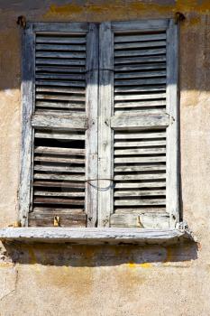 lonate ceppino varese italy abstract  window      wood venetian blind in the concrete  blue