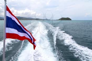 asia myanmar kho samui bay isle waving flag    in thailand and south china sea 