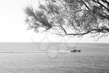 in greece near the coastline boat and yacht and sunrise light