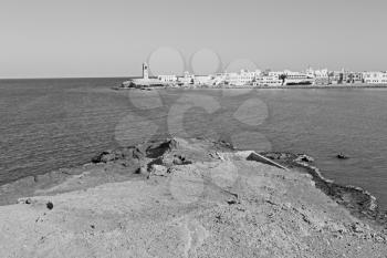 fort battlesment sky  and   star brick in oman muscat the old defensive   sea mountain