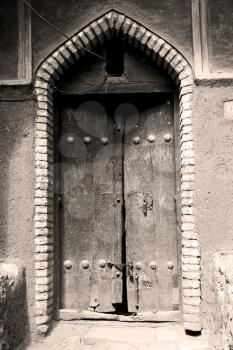 blur in iran old door near the mosque and antique construction