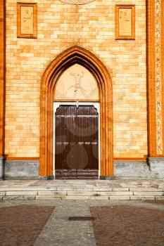 lombardy    in  the  villa cortese  old   church  closed brick tower wall  italy