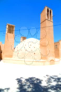 in blur  iran   yazd  the old  wind tower construction  used to frozen water and ice