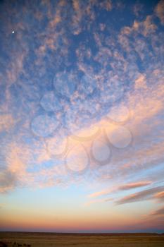 sunrise in the colored sky white soft clouds and abstract background