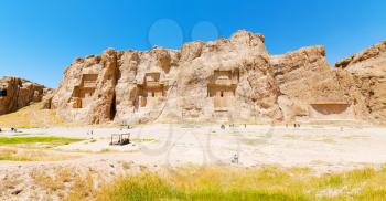 blur in iran near persepolis the old ruins historical destination monuments and mountain
