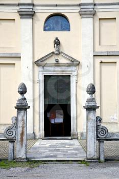  italy  sumirago church  varese  the old door entrance and mosaic sunny daY 