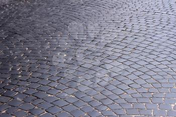 The road, covered with black stones. Lviv, Ukraine