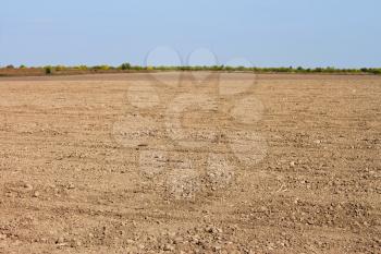 Soil in the field after harvesting in fine autumn day 