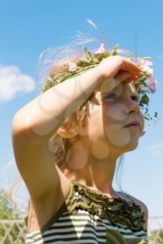 Girl in the grass wreath convolvulus arvensis lookong at sky 4632