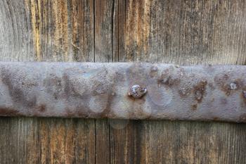 Old wooden door with bolt and nut 19959
