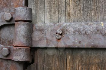 Old wooden door with bolt and nut 20439